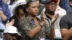 Candi Gauff, the mother of United States' Cori "Coco" Gauff applauds as she plays United States's Venus Williams in a Women's singles match during day one of the Wimbledon Tennis Championships in London, Monday, July 1, 2019. (AP Photo/Tim Ireland)