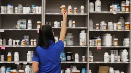 MIDVALE, UT - SEPTEMBER 10: A pharmacy technician grabs a bottle of drugs off a shelve at the central pharmacy of Intermountain Heathcare on September 10, 2018 in Midvale, Utah. IHC along with other hospitals and philanthropies are launching a nonprofit generic drug company called "Civica Rx" to help reduce cost and shortages of generic drugs.  (Photo by George Frey/Getty Images)