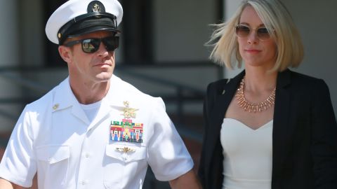Navy SEAL Edward Gallagher leaves military court in San Diego with his wife Andrea Gallagher on Tuesday.