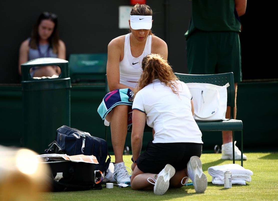 Maria Sharapova was seen by the trainer for a left forearm issue at Wimbledon on Tuesday and had to retire.