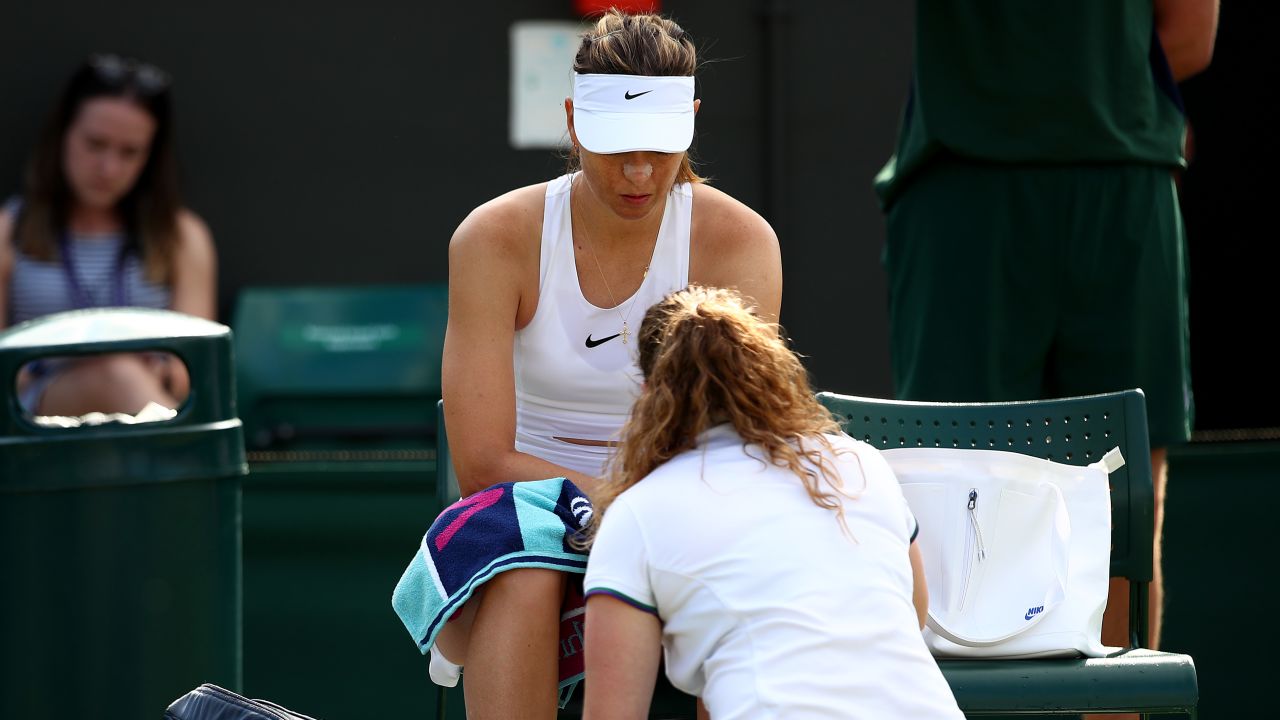 Maria Sharapova was seen by the trainer for a left forearm issue at Wimbledon on Tuesday and had to retire. 