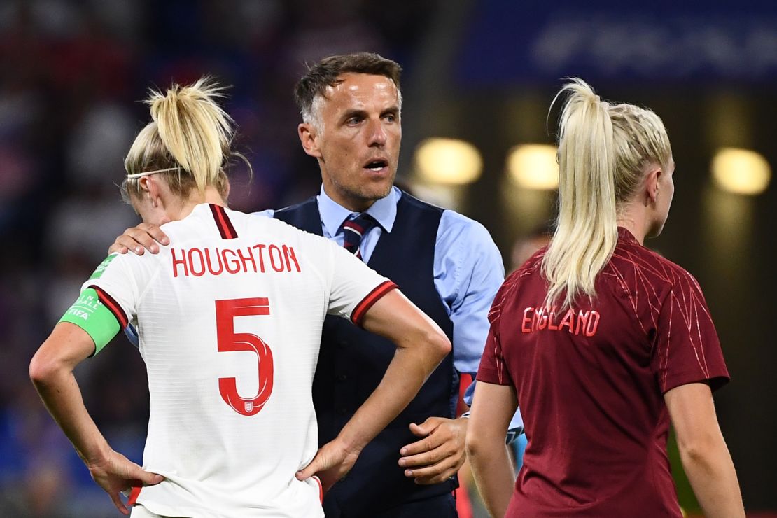 Phil Neville consoles England captain Steph Houghton after the Lionesses' Women's World Cup semifinal defeat.