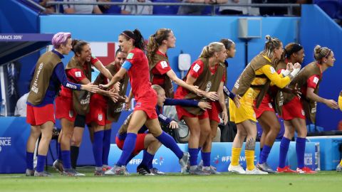 The US team celebrates after Alex Morgan's goal.