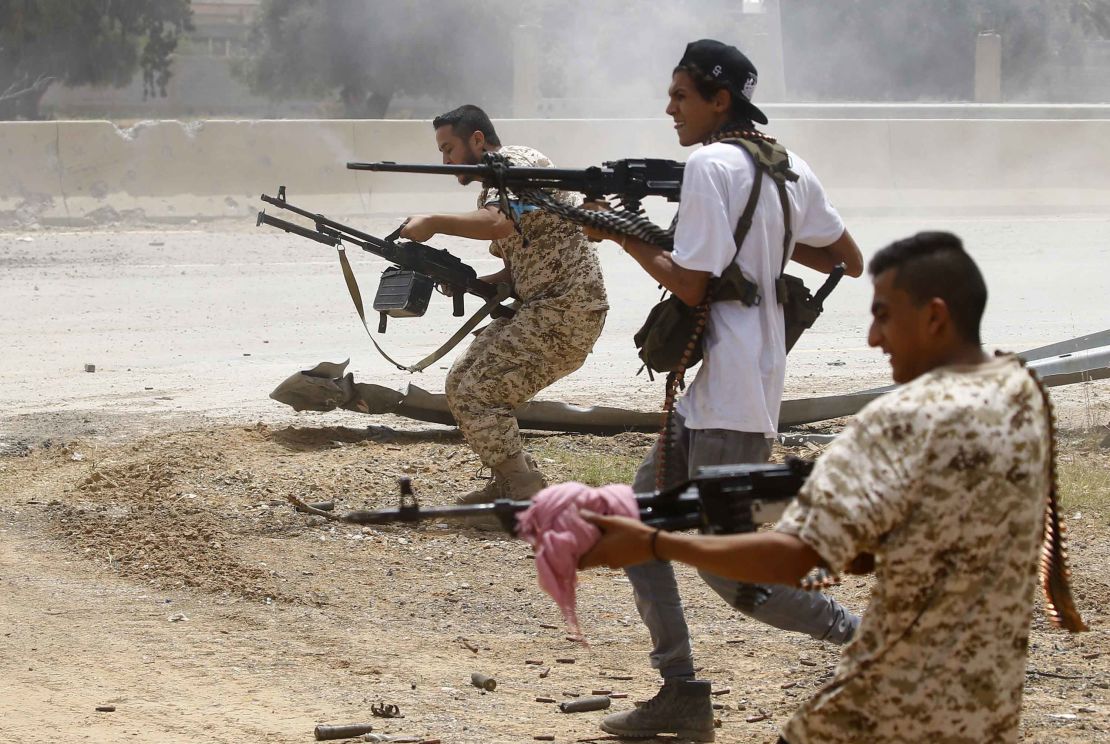 Fighters loyal to the internationally-recognised Libyan government clashes with forces loyal to strongman Khalifa Haftar south of Tripoli in June 2019.