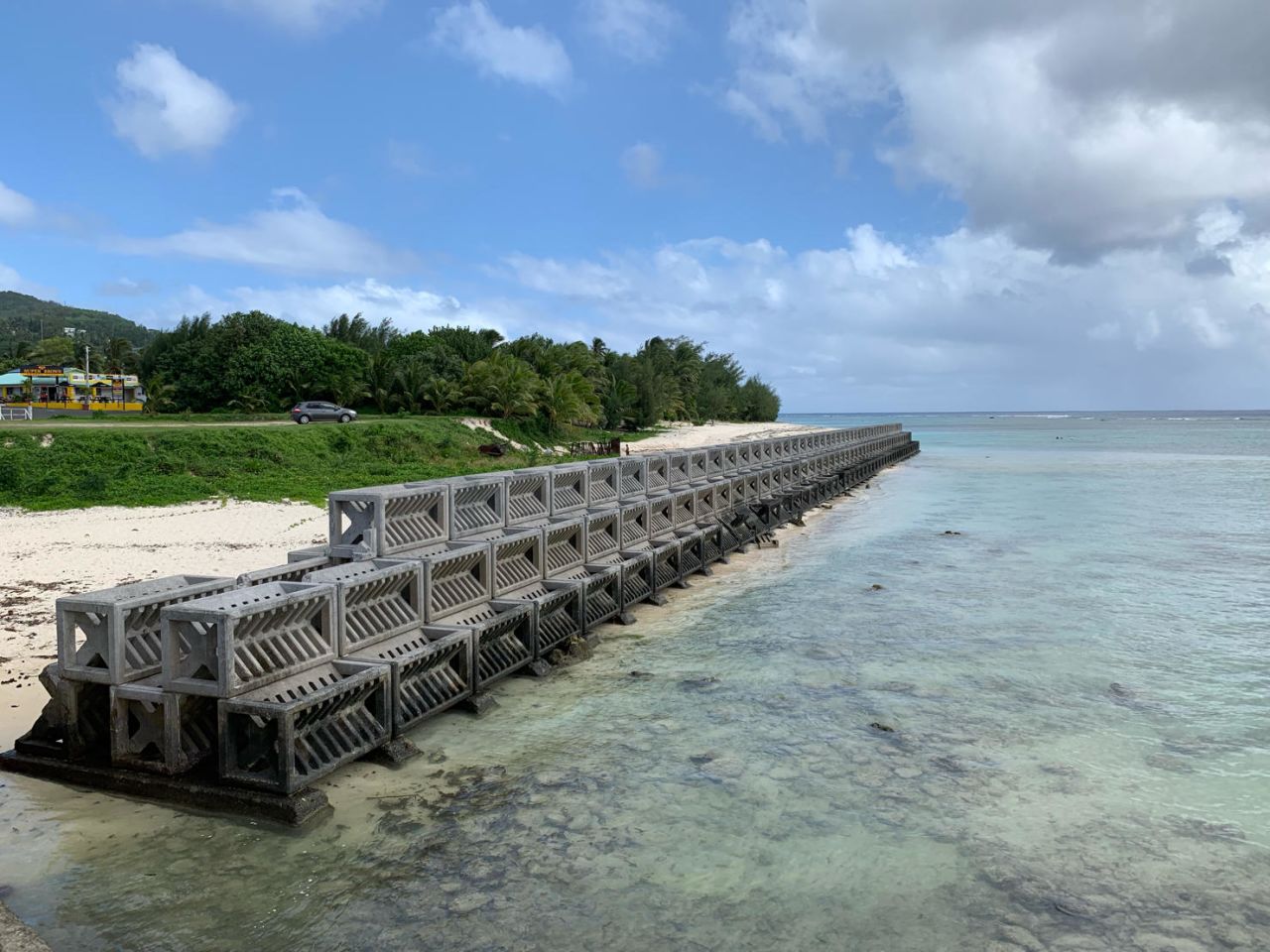 This seawall on the beach off Rarotonga, Cook Islands, uses fiber-reinforced concrete armour units to help dissipate wave energy while allowing water to pass through.  