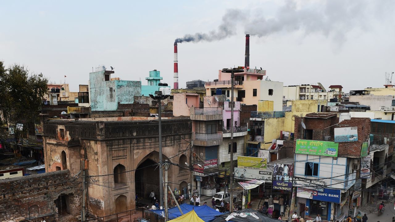 In this photograph taken on April 6, 2015, smoke billows from two smoke stacks at the coal-based Badarpur Thermal Station in New Delhi. A study by the Centre of Science and Environment in India found the plant which produces 705 MW (Megawatts) is one of the country's most polluting and inefficient power plants. Authorities insist they must focus on meeting the growing needs of its 1.25 billion people, 300 million of whom lack access to electricity. In its action plan for the Paris COP21 meet, India pledges to reduce its carbon intensity -- a measure of a country's emissions relative to its economic output -- by 35 percent by 2030, rather than an absolute cut in emissions.
Globally, India is the third largest carbon-emitting country -- though its per capita emissions are only one third of the international average -- according to the World Resources Institute. AFP PHOTO / MONEY SHARMA