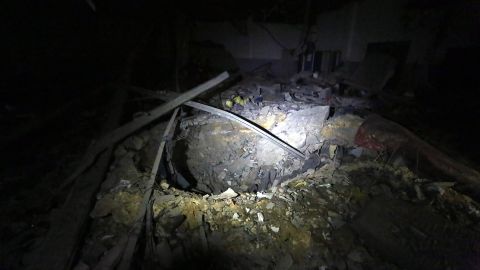 The point of impact of a bomb is seen inside Tajoura Detention Center after an airstrike killed at least 40, east of Tripoli on early July 3.