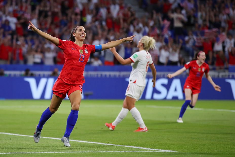 Morgan celebrates her tournament-leading sixth goal in the 2-1 semifinal win against England on Tuesday, July 2. Rapinoe and England's Ellen White later tied her.