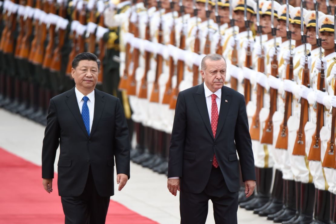 Turkish President Recep Tayyip Erdogan and Chinese President Xi Jinping inspect Chinese honour guards during a welcome ceremony outside the Great Hall of the People in Beijing on July 2.