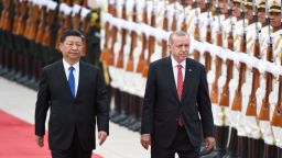 Turkish President Recep Tayyip Erdogan and Chinese President Xi Jinping inspect Chinese honor guards during a welcome ceremony outside the Great Hall of the People in Beijing on July 2.