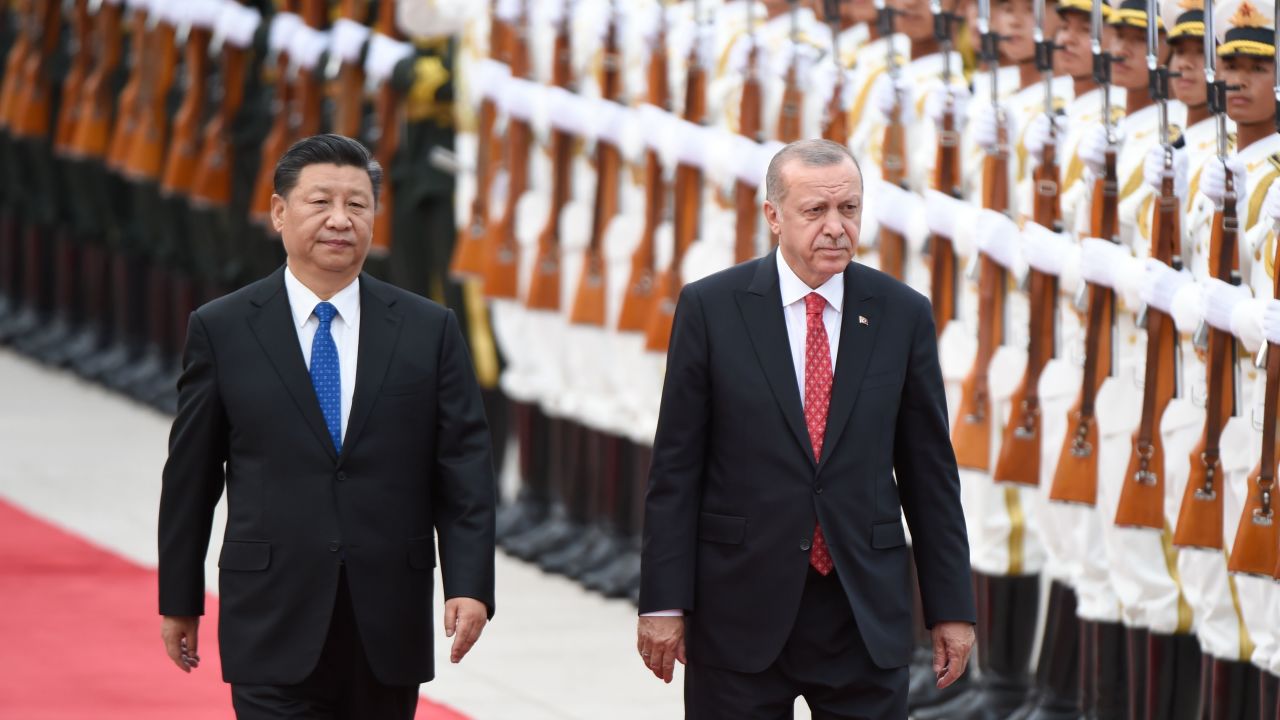 Turkish President Recep Tayyip Erdogan and Chinese President Xi Jinping inspect Chinese honour guards during a welcome ceremony outside the Great Hall of the People in Beijing on July 2.