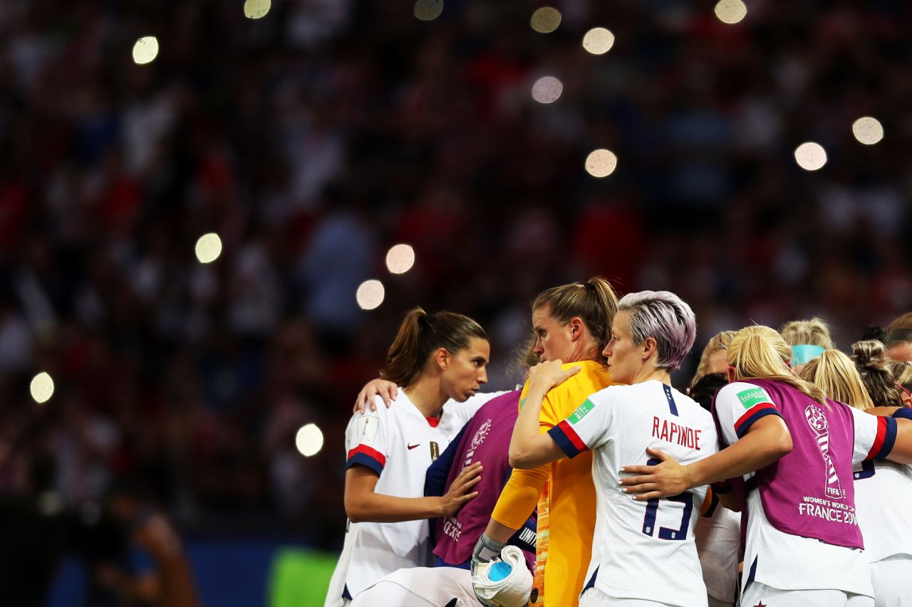 The US team huddles before the second half of the France match.