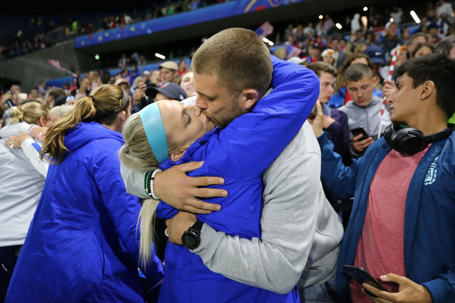 US midfielder Julie Ertz gets a kiss from her husband, NFL star Zach Ertz, after <a href="index.php?page=&url=https%3A%2F%2Fwww.cnn.com%2F2019%2F06%2F20%2Ffootball%2Fuswnt-sweden-womens-world-cup-spt-int%2Findex.html" target="_blank">the Americans defeated Sweden 2-0</a> in the final match of the group stage.