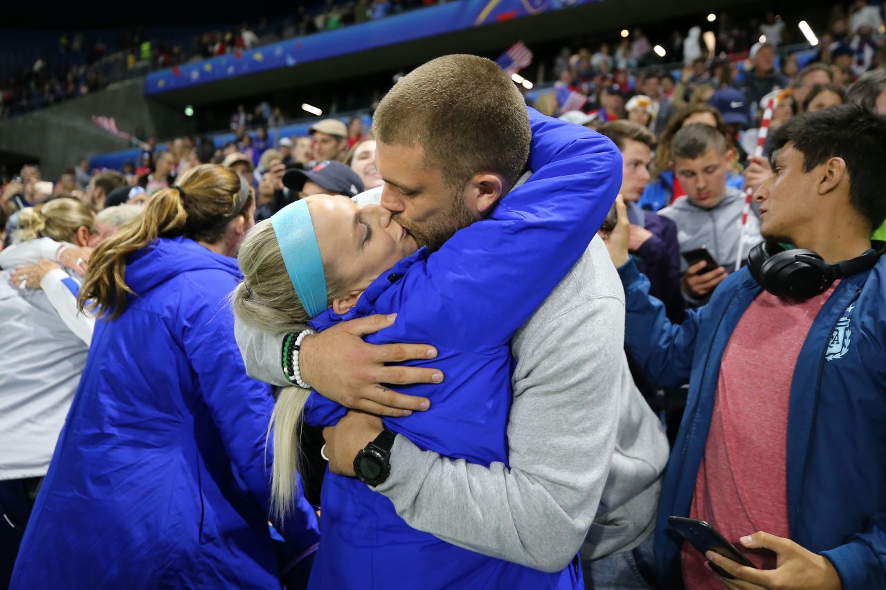 US midfielder Julie Ertz gets a kiss from her husband, NFL star Zach Ertz, after <a href="https://www.cnn.com/2019/06/20/football/uswnt-sweden-womens-world-cup-spt-int/index.html" target="_blank">the Americans defeated Sweden 2-0</a> in the final match of the group stage.