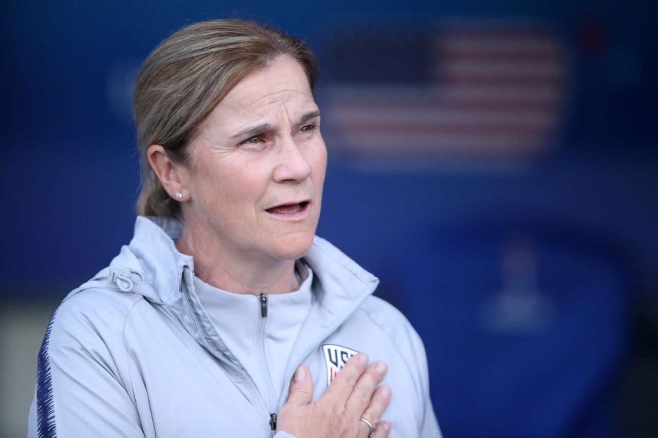 US head coach Jill Ellis sings the National Anthem before the group-stage match against Chile. Ellis was also the coach when the US team won the World Cup four years ago.