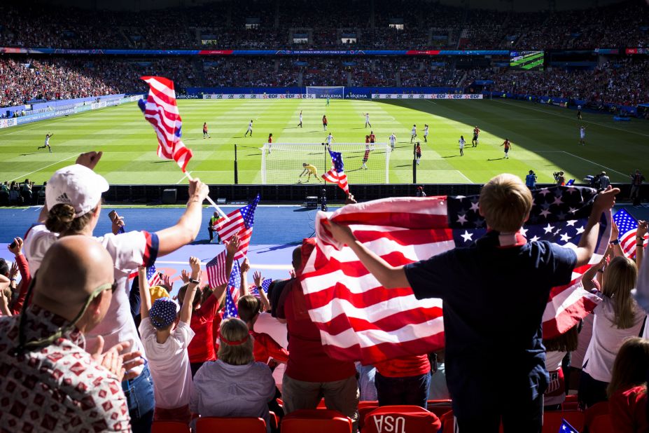 US fans celebrate a goal in the Americans' 3-0 victory over Chile. Thousands of US fans made the trip to France.