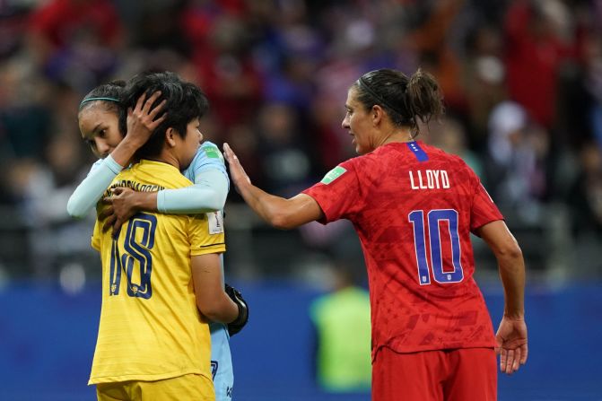 Lloyd consoles some of the Thai players after the blowout victory.