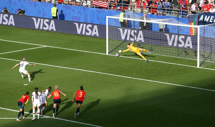 Rapinoe slots home a goal from the penalty spot during <a href="index.php?page=&url=https%3A%2F%2Fwww.cnn.com%2F2019%2F06%2F24%2Ffootball%2Fusa-spain-womens-world-cup-last-16-spt-intl%2Findex.html" target="_blank">the Americans' 2-1 victory over Spain</a> in the round of 16. Rapinoe again had both goals. Both were off penalties.