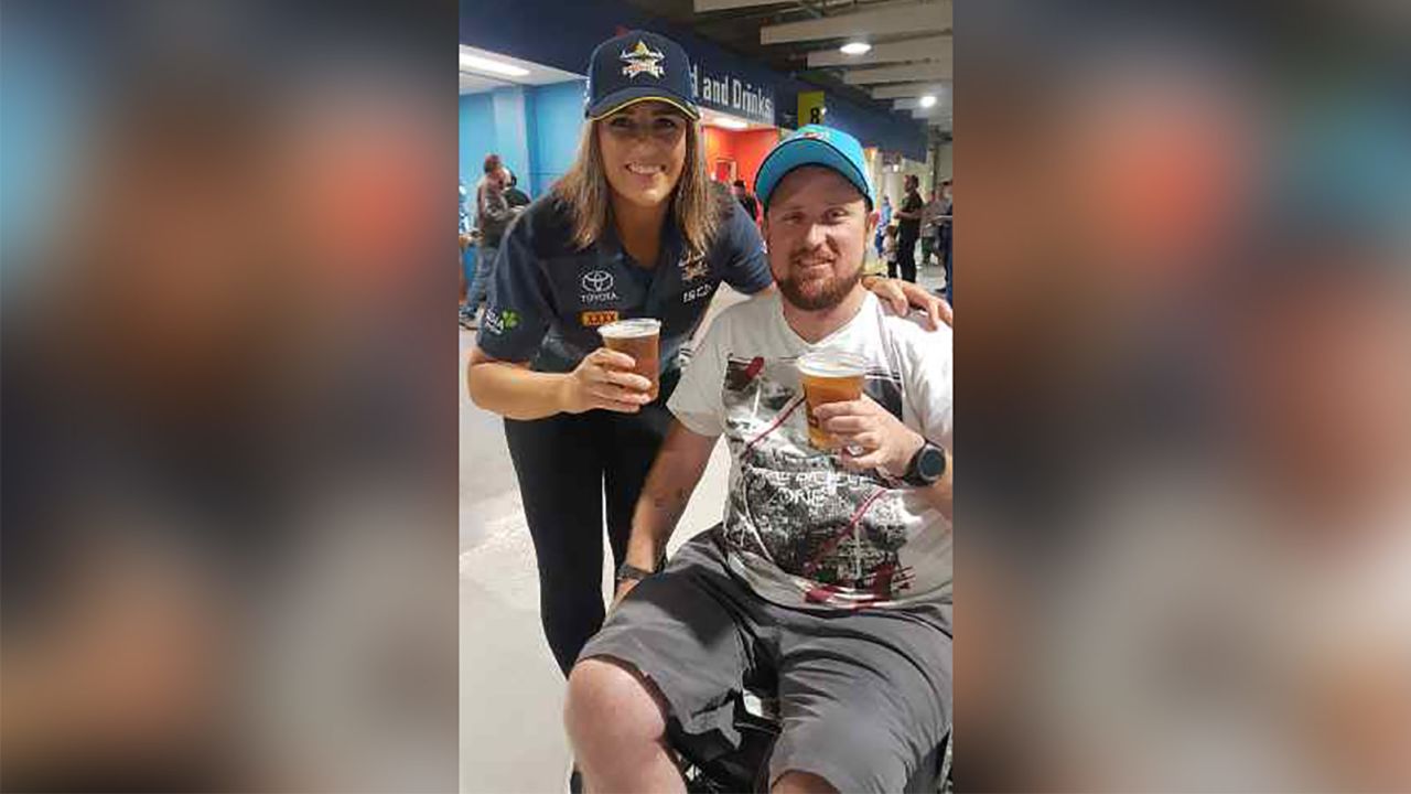 After undergoing nerve transfer surgery,  Paul Robinson, 34, was able to hold a glass of beer. 