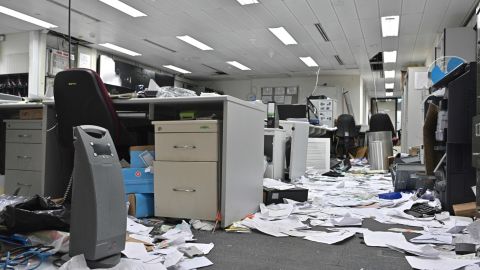 Papers and items are seen scattered across a control room during a media tour of the Legislative Council.