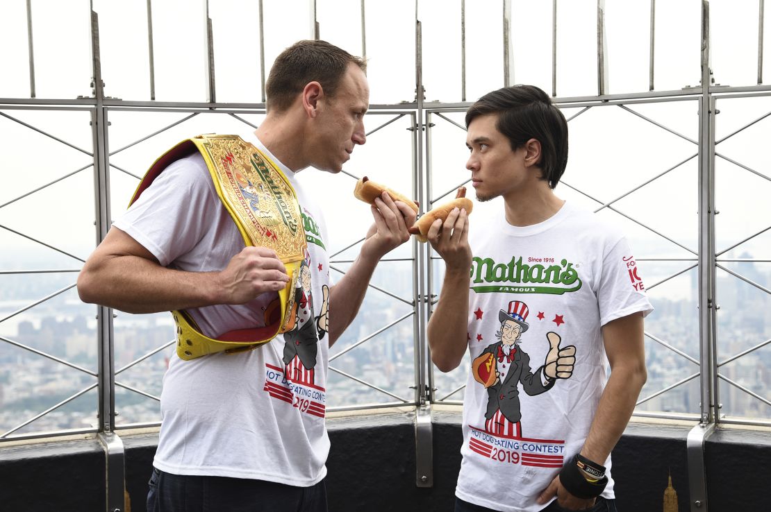 Defending men's champion Joey Chestnut, left, and former champion Matt Stonie during the contest weigh-in on Wednesday at the Empire State Building in New York. (Photo by Evan Agostini/Invision/AP)