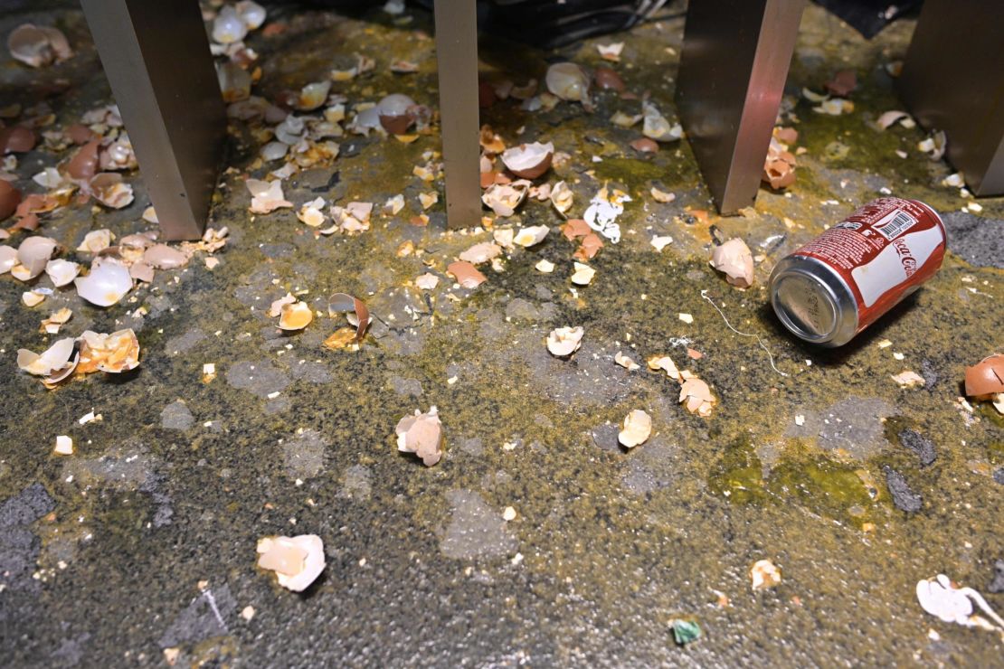 Egg shells and other debris are seen on the ground floor during a media tour of the Legislative Council, Wednesday.