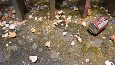 Egg shells and other debris are seen on the ground floor during a media tour of the Legislative Council, Wednesday.
