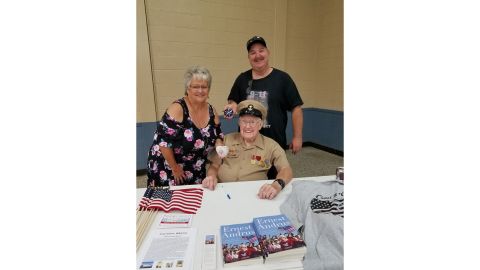 Andrus, center, joined a team of Navy veterans to restore a LST 325, a tanker he served on in World War II.