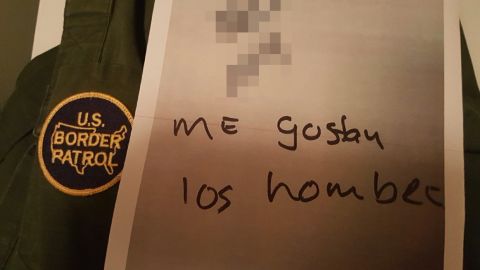 The migrant was forced to hold a piece of paper that reads "me gustan los hombre(s)", which translates to "I like men," while being paraded through a detention center, according to emails obtained by CNN