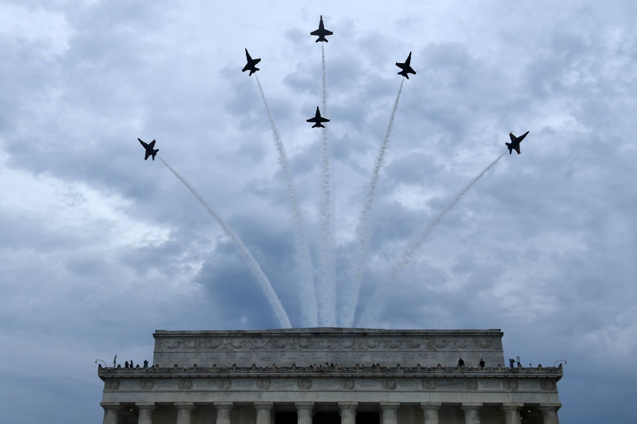 The Blue Angels, the US Navy's flight demonstration squadron, perform after the President's closing remarks.