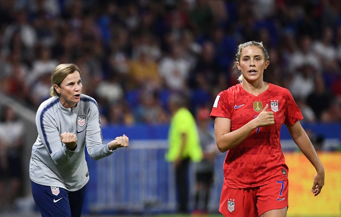 Ellis speaks to defender Abby Dahlkemper during the semi-final against England.