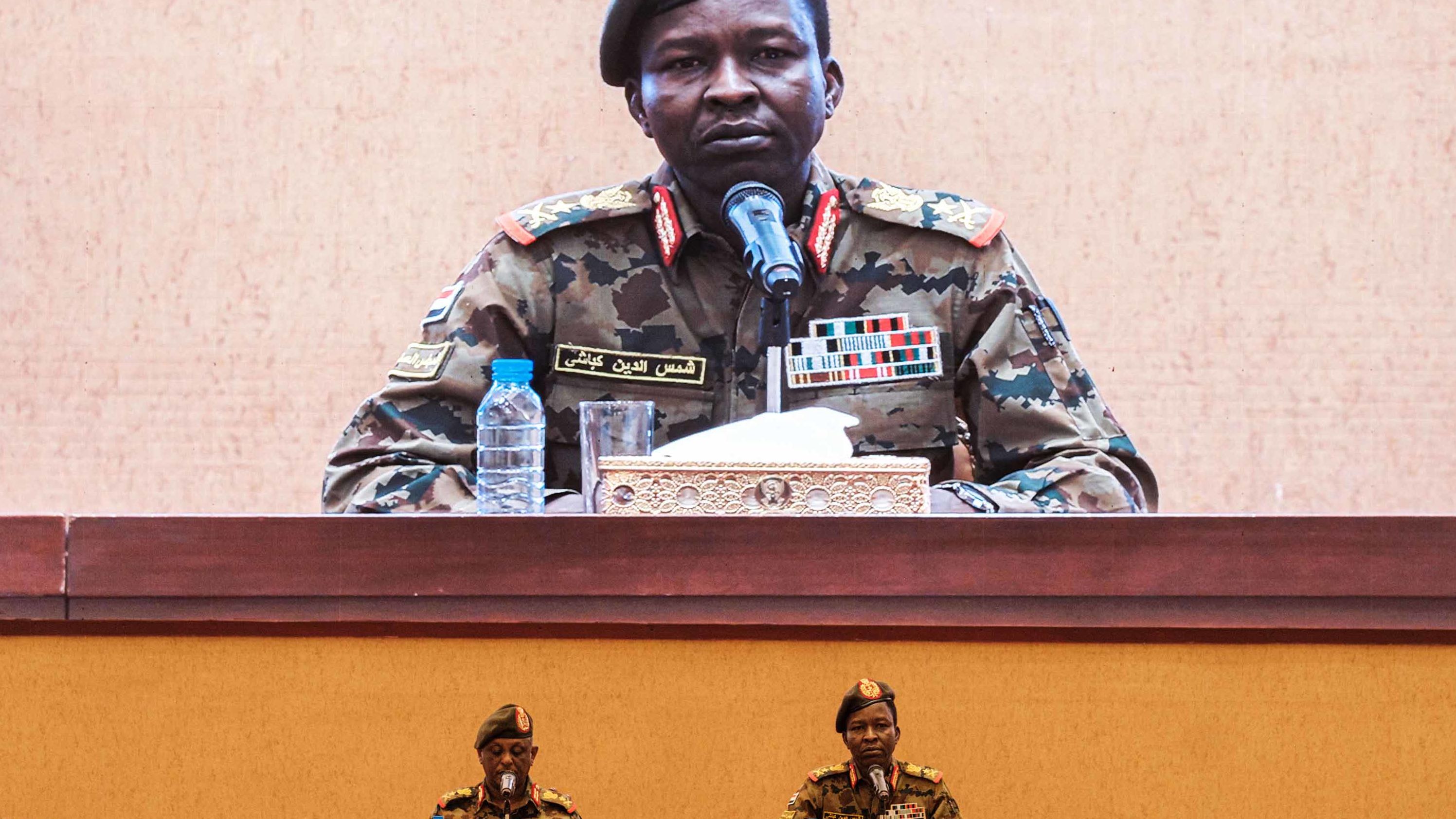 Sudan's Transitional Military Council spokesman Shams-Eddin Kabashi, right, speaks during a press conference at the Presidential Palace in Khartoum on June 13. Sudan's ruling military council admitted that it had ordered the dispersal of a Khartoum sit-in, which left more than 100 dead.