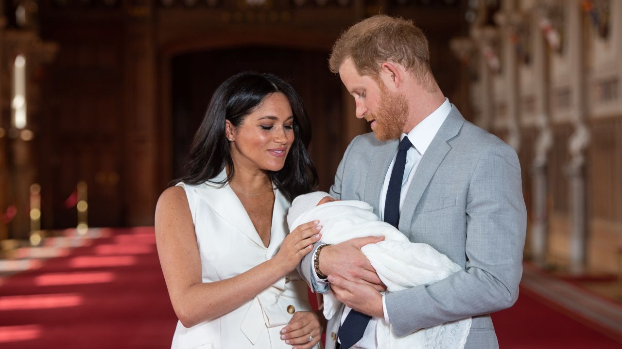 Prince Harry, Duke of Sussex and Meghan, Duchess of Sussex, pose with their newborn son Archie Harrison Mountbatten-Windsor on May 8.
