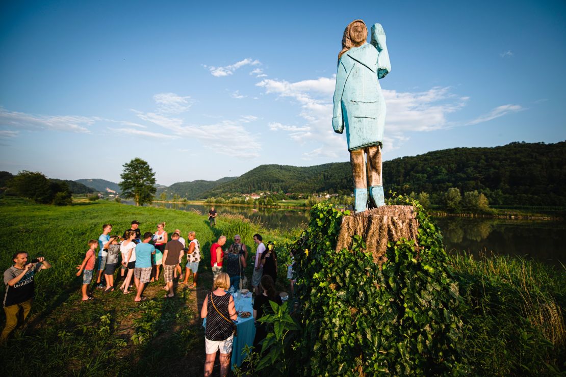 Locals gathered to view the sculpture, which is located near Melania Trump's hometown of Sevnica. 
