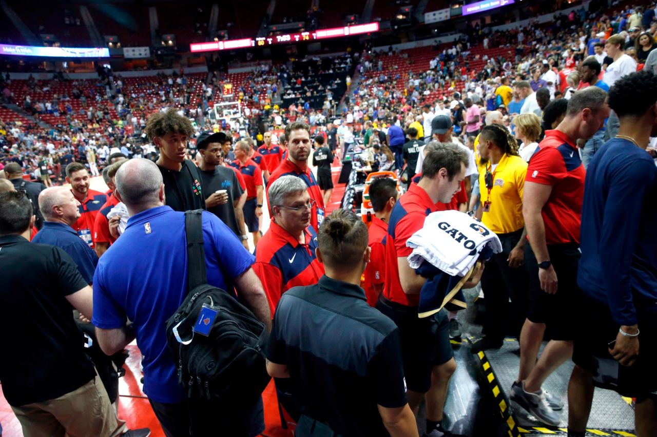 Players and staff leave the court after an earthquake during an NBA summer league basketball game between the New York Knicks and the New Orleans Pelicans on Friday in Las Vegas. 