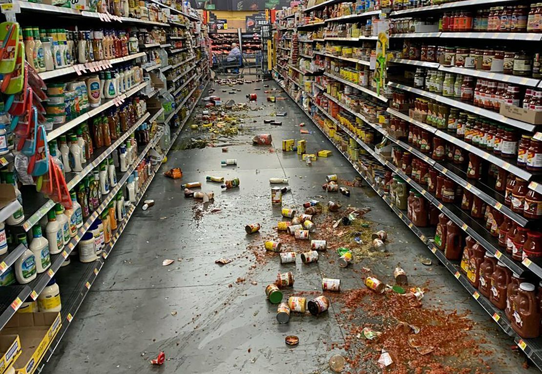 Food that fell from shelves litters the aisle at a Walmart in Yucca Valley, California, following the earthquake on Friday.