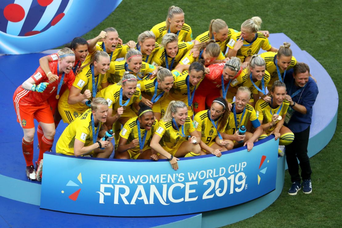 Sweden's players celebrate with their third place medals.