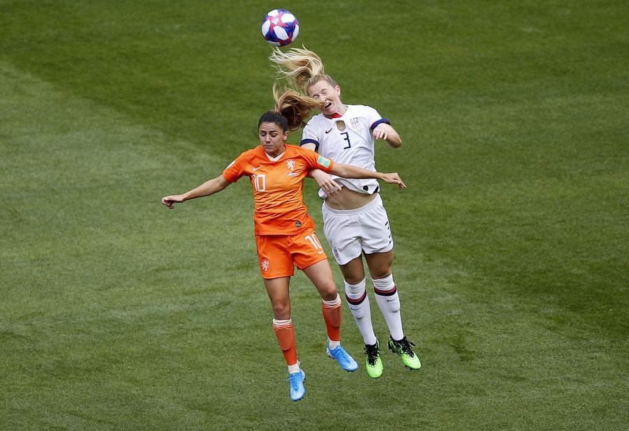 American midfielder Samantha Mewis, right, and Dutch midfielder Danielle van de Donk compete for a header in the early minutes of the final.