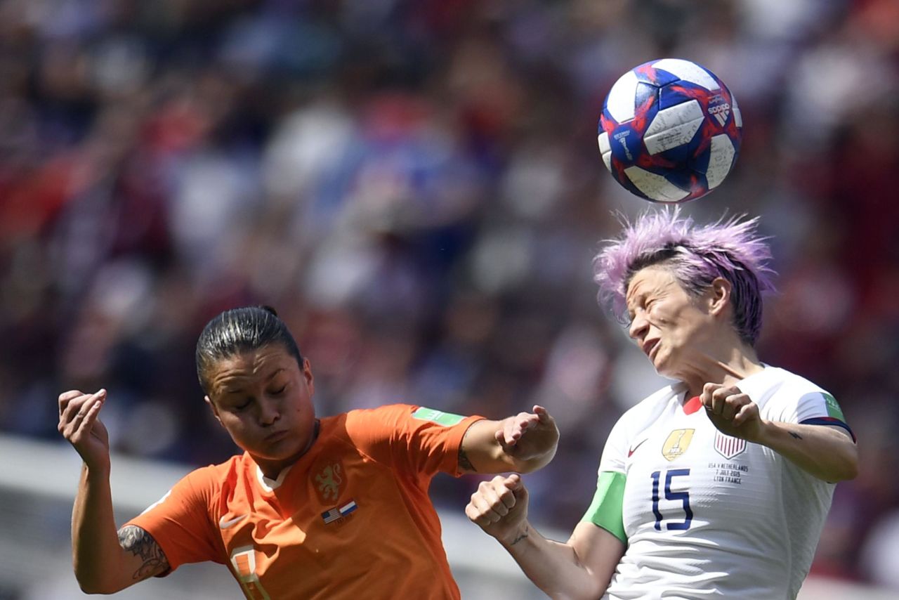 Rapinoe connects on a header.