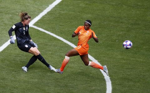US goalkeeper Alyssa Naeher, left, clears the ball before Beerensteyn could get to it in the first half.