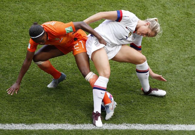 US defender Abby Dahlkemper battles Lineth Beerensteyn for the ball.