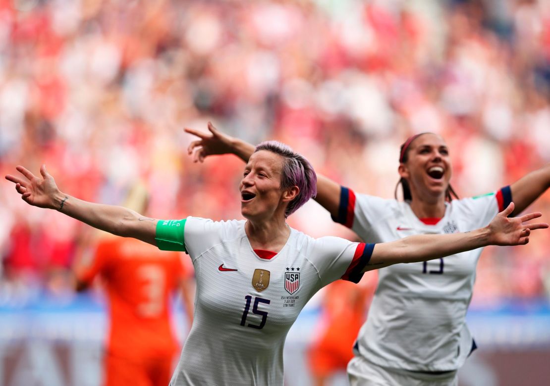 Megan Rapinoe celebrates after scoring the opening goal in Sunday's game