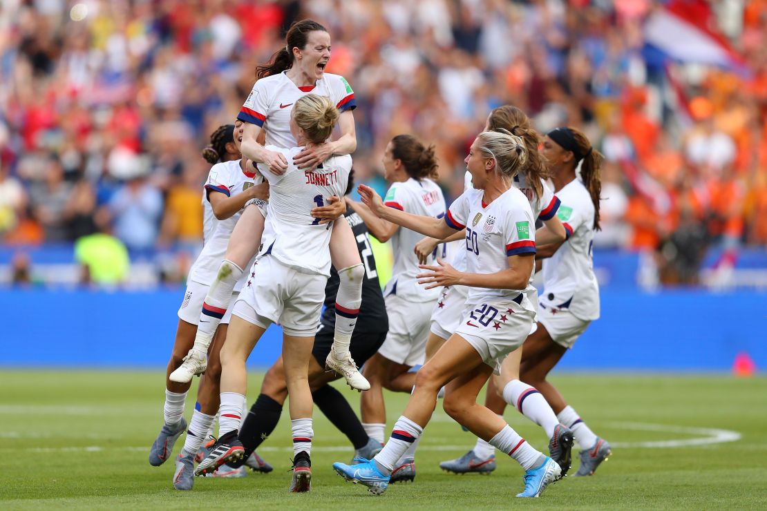 Rose Lavelle of the USWNT celebrates with Emily Sonnett after winning Women's World Cup final.
