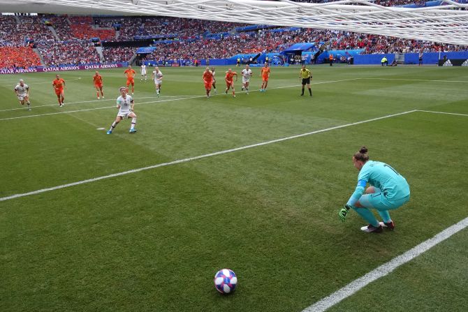 Rapinoe slots home her penalty past Sari van Veenendaal.