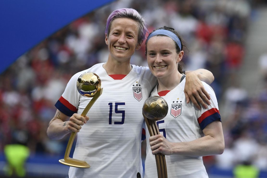 Megan Rapinoe poses with the Golden Ball next to Rose Lavelle with the Bronze Ball.
