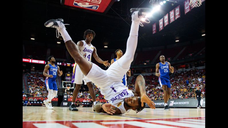 Los Angeles Lakers guard Codi Miller-McIntyre falls to the ground during an NBA Summer League game against the Los Angeles Clippers in Las Vegas, Nevada, on Saturday, July 6.