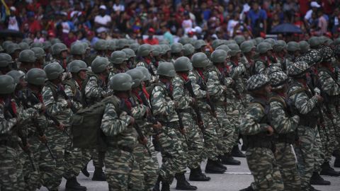 Members of the National Army march during a Venezuela Independence Day military parade in Caracas, Venezuela, on Friday, June 5, 2019.