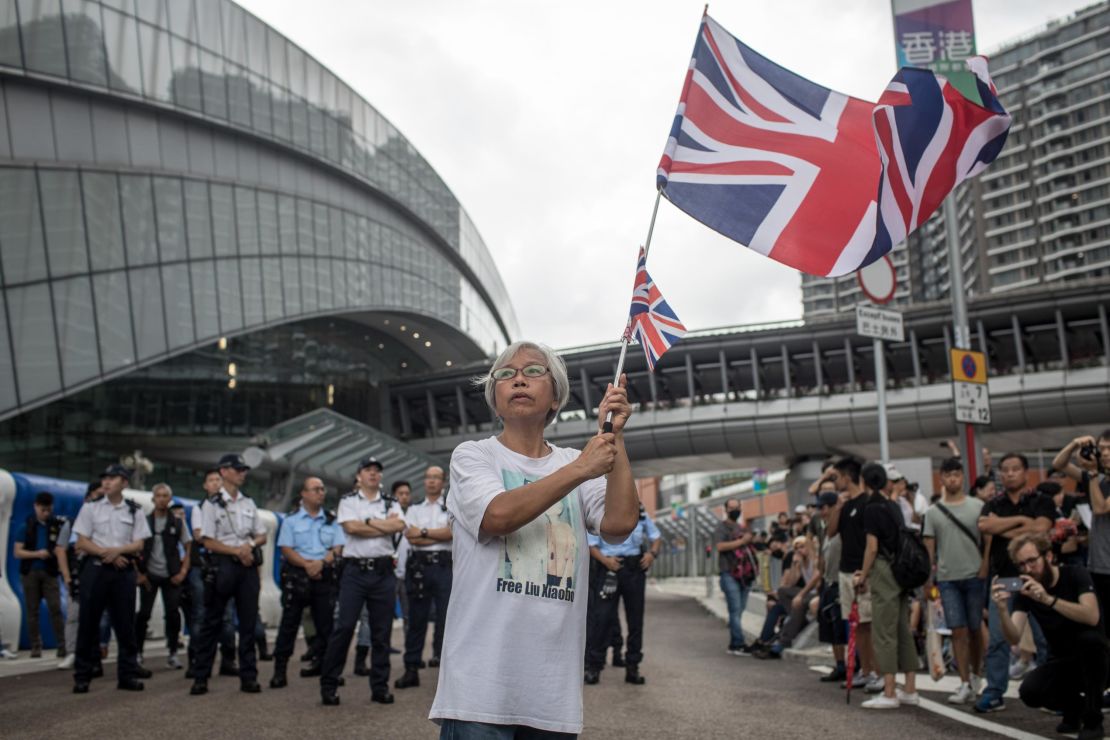 A protester waves a UK flag during a Hong Kong protest on July 7, 2019.