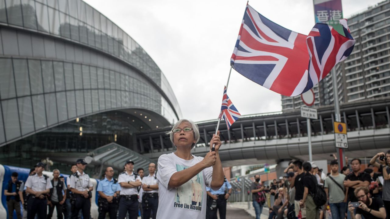 A protester waves a UK flag during a Hong Kong protest on July 7, 2019.