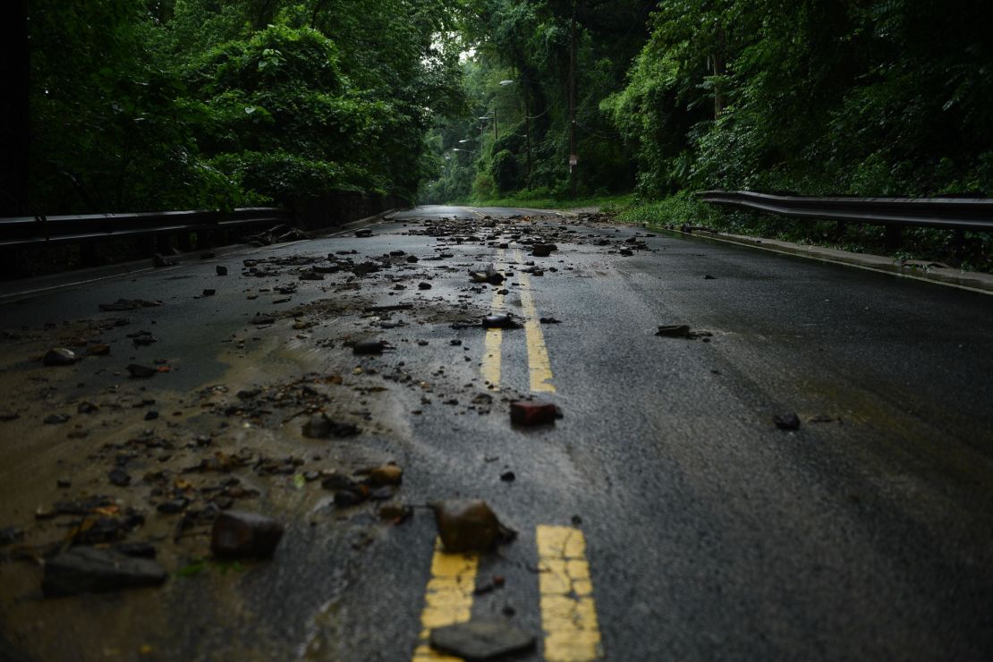 Flood debris from the rain storm is seen on Canal Road in Washington,DC.  